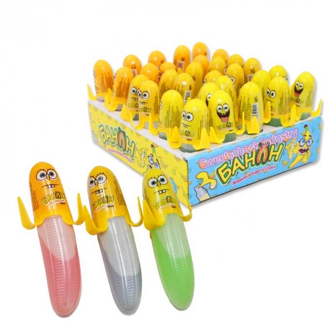 Sucrerie liquide de jet d'enfants dans la boîte douce de saveur de fruit de forme de banane emballée